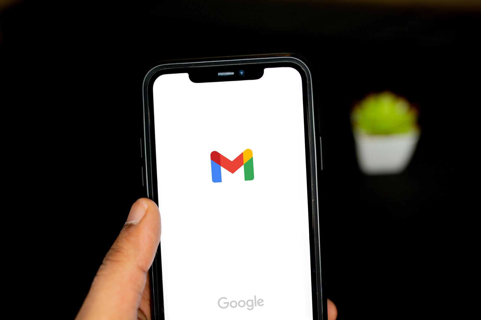 A mobile displaying the Gmail loading screen.