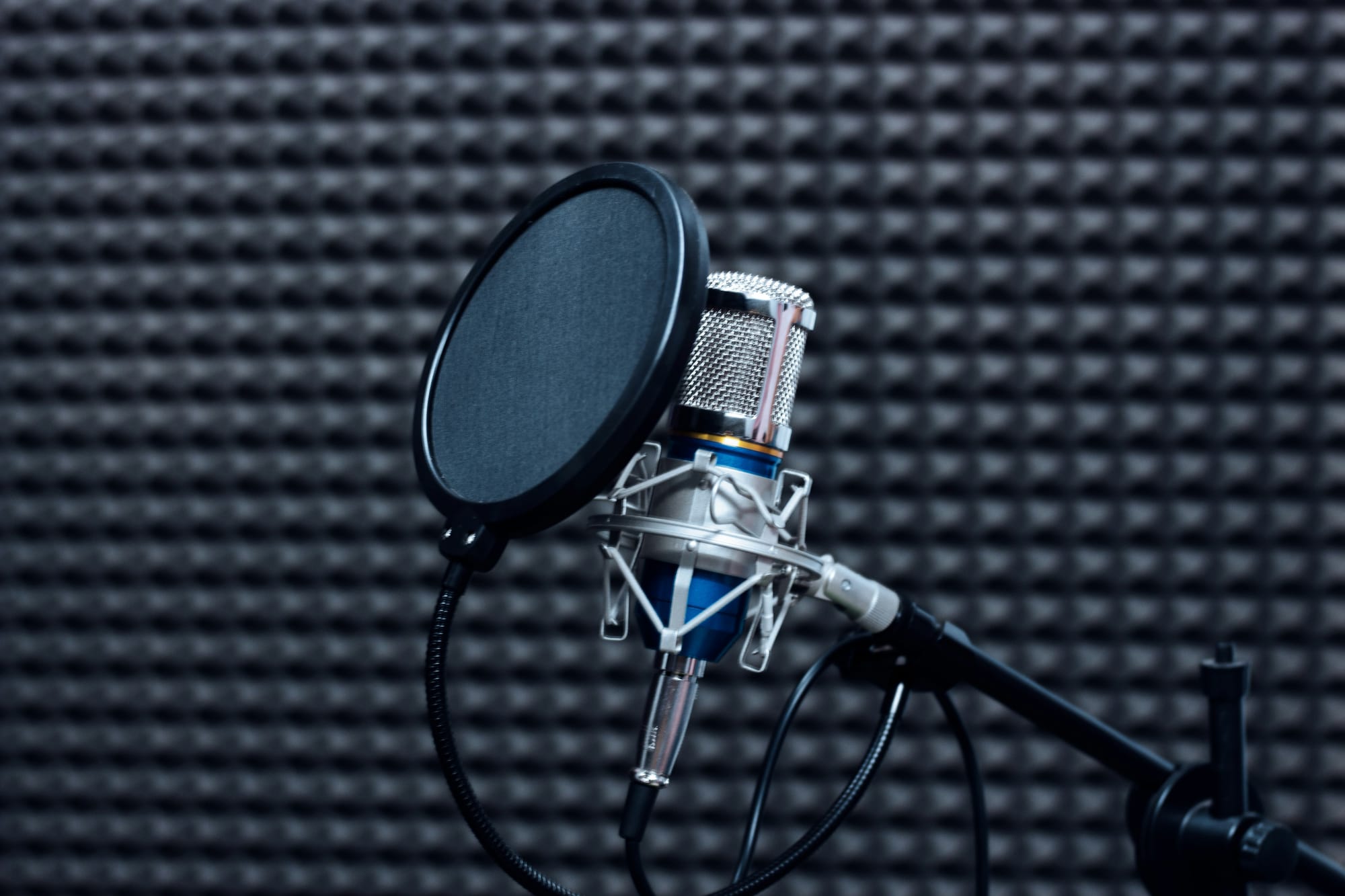 microphone set up with boom arm, shock mount and pop filter attachments